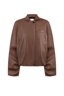 Brown bomber jacket in fox leather by ELENAREVA, shown in a close-up image highlighting the textured leather material and stylish design.