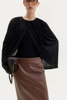 Brown midi skirt in fox leather by ELENAREVA, featuring a sleek design and soft texture, perfect for stylish everyday wear.