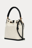 Saonara bucket shoulder bag in linen and black leather, featuring a stylish and spacious design with a drawstring closure.