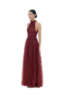 Burgundy smocked lace gown by Montsand featuring intricate lace details and a flowing maxi dress design.