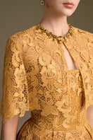 Yellow Cult Mia X I.H.F bustier A-line gown with mini cape and guipure lace, showcasing elegant formal wear design.