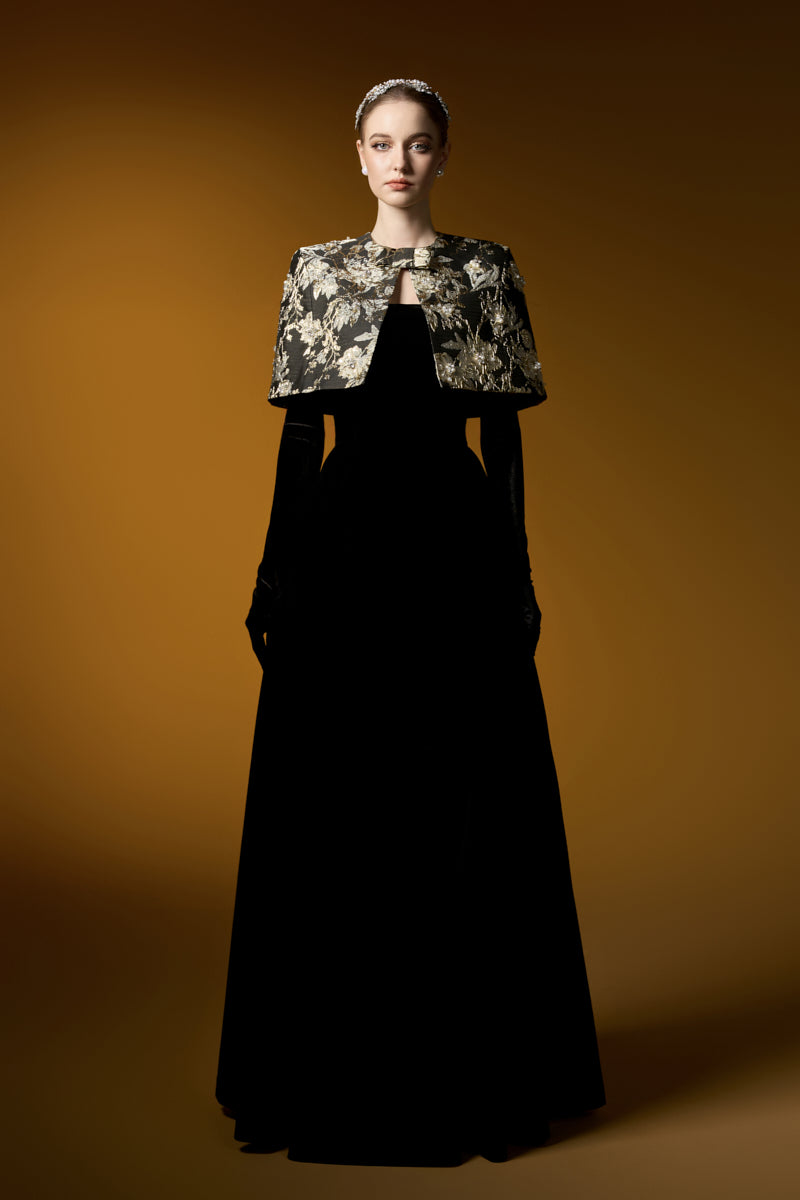 I.H.F Mirabelle Lyon velvet and jacquard gown with A-line silhouette and mini cape for elegant evening wear.
