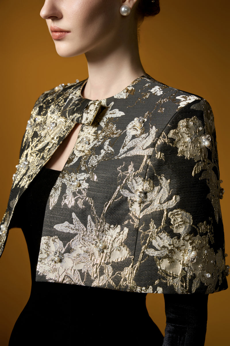 I.H.F Mirabelle Lyon velvet and jacquard gown featuring an A-line silhouette and a mini cape for elegant evening wear.