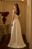 Elegant VIVA velvet and taffeta gown by I.H.F featuring a burstier column silhouette with shoulder draped detail.