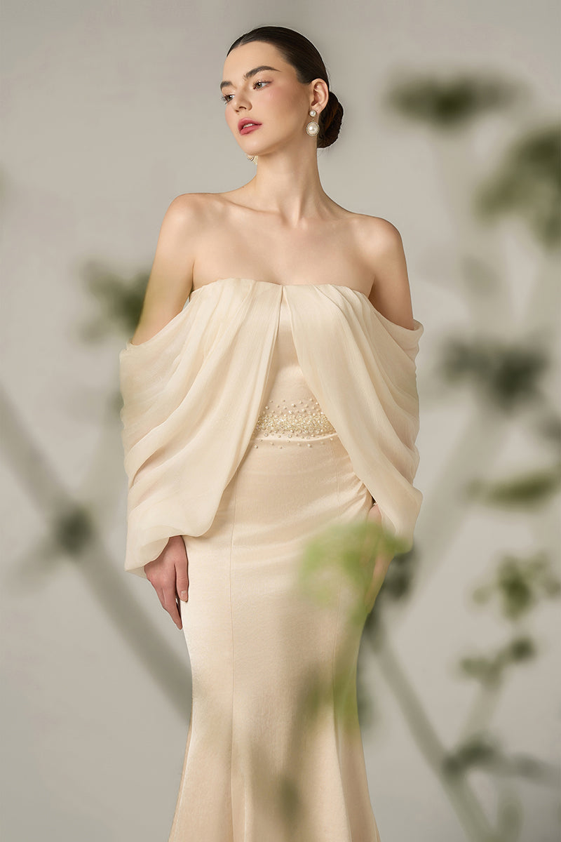 Gold silk taffeta and chiffon mermaid gown with off-shoulder neckline and bishop sleeves by I.H.F.