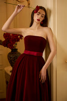 I.H.F Lyla Lyon velvet gown featuring a pleated A-line design, elegant and flowing fabric perfect for formal occasions.