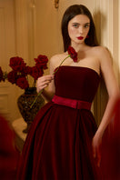 I.H.F Lyla Lyon velvet gown featuring a burstier pleated A-line design, elegant and flowing for formal occasions.