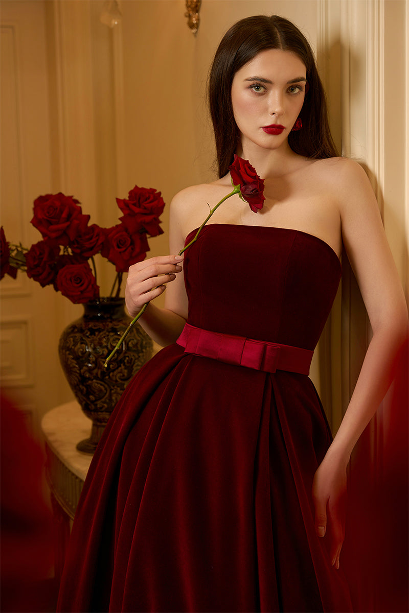 I.H.F Lyla Lyon velvet gown featuring a burstier pleated A-line design, elegant and flowing for formal occasions.