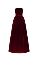 Pink velvet LYLA LYON gown by I.H.F with burstier pleats and A-line silhouette, showcased on a model in a stylish setting.