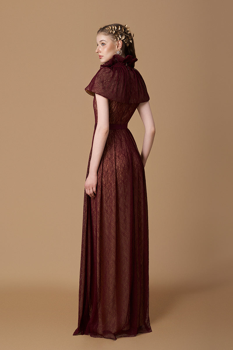 I.H.F Bordeaux vine guipure lace gown featuring a bustier, A-line silhouette, and a mini cape in dark red lace.