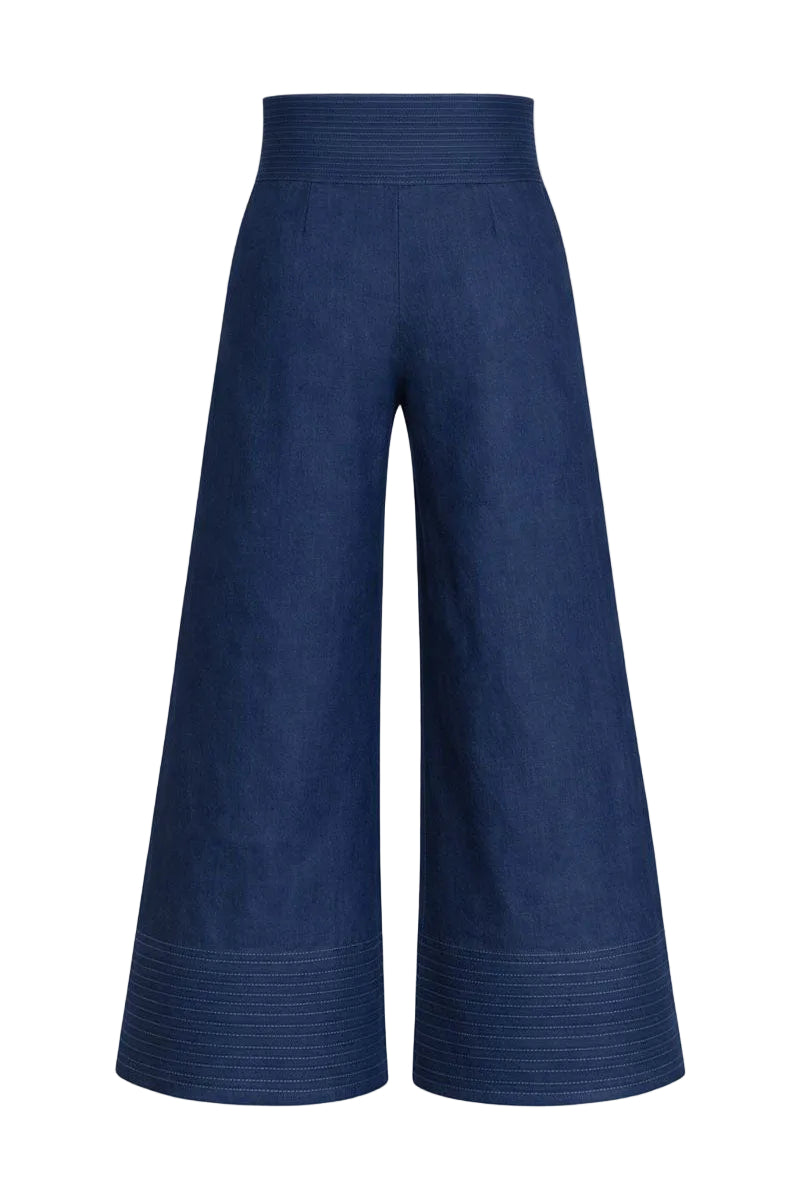 Dark blue button pants by ANA + MARIA, featuring a tailored fit and front buttons, shown on a model.