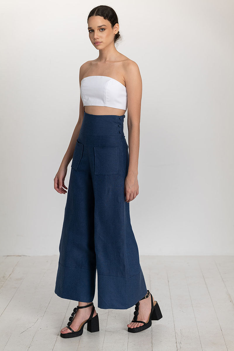 Dark blue button pants by ANA + MARIA, featuring a tailored fit and front buttons, displayed on a neutral background.