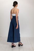 Dark blue button pants by ANA + MARIA, featuring a front button closure and tailored fit, displayed on a neutral background.