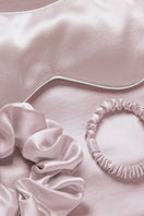 MANITO Sleeping Beauty gift box with soft pink hair accessories, including hair clips and scrunchies, for elegant style.