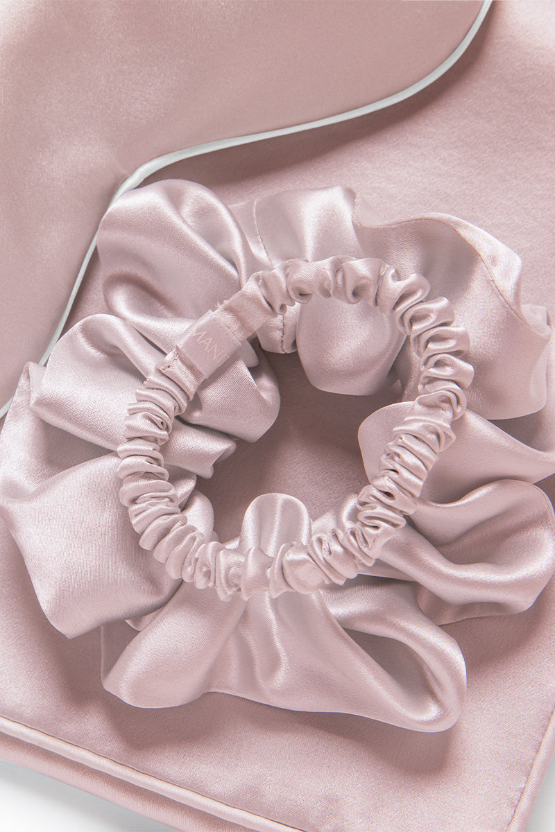 Manito Sleeping Beauty gift box with soft pink hair accessories, including hair clips and scrunchies, perfect for gifting.
