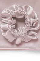 Soft pink Sleeping Beauty gift box with hair accessories from MANITO, featuring hair clips and decorative hairpieces.