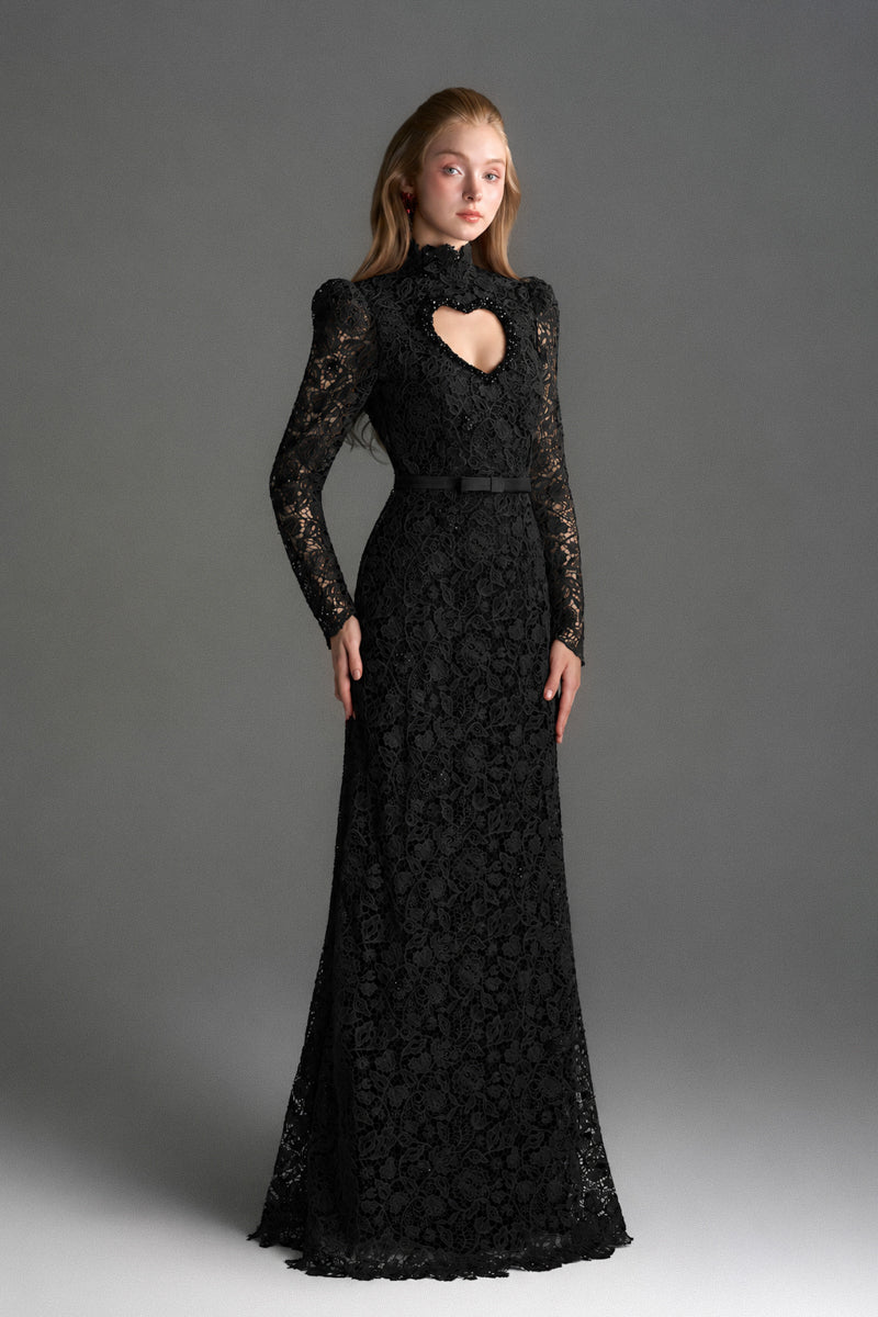 Black lace maxi gown with floral vine pattern, long sleeves, and heart cutout, designed by I.H.F Studio.