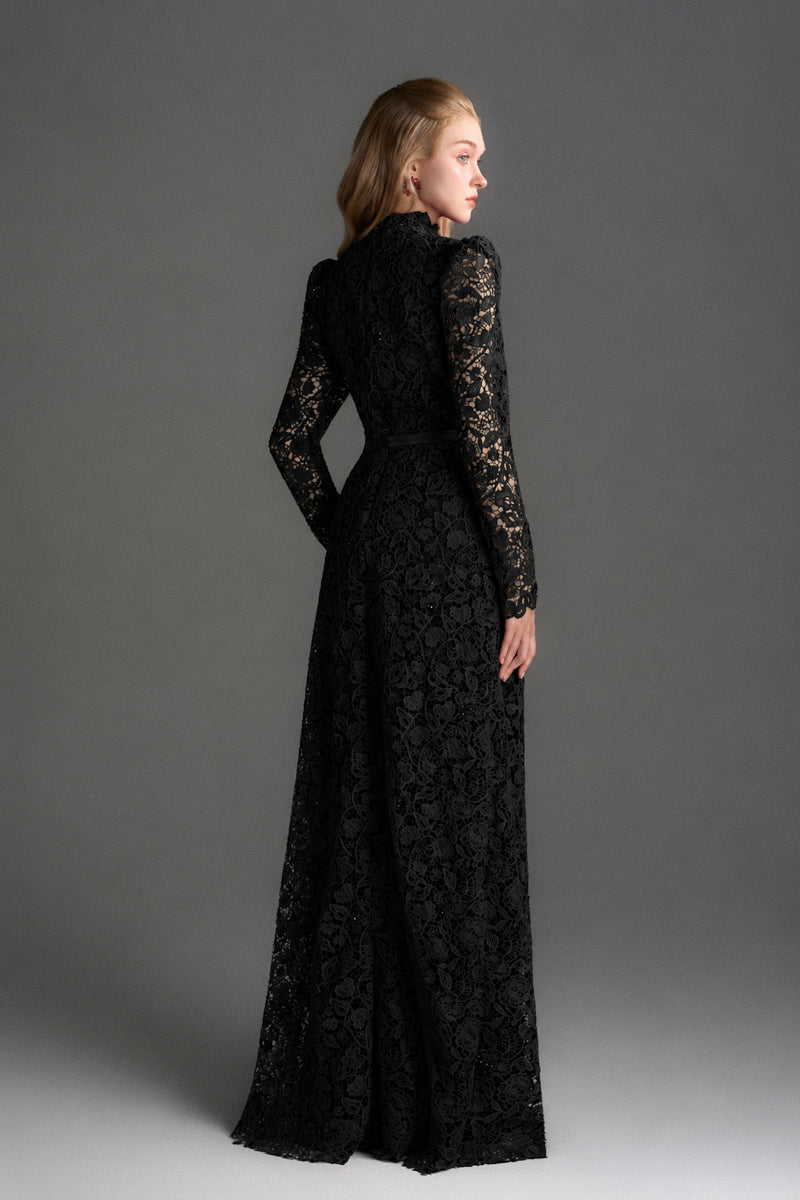 Black floral lace maxi gown with long sleeves, heart cutout, and balloon drawstring from I.H.F Studio.