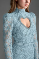 Blue floral lace long-sleeve maxi gown by I.H.F Studio featuring a heart cutout and balloon drawstring detail.
