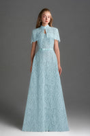 Blue architectural lace bustier A-line gown with mini cape and crystal embellishments by I.H.F Studio, elegant evening dress.