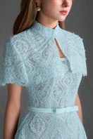 Blue architectural lace bustier A-line gown with mini cape and crystal embellishments, designed by I.H.F Studio.