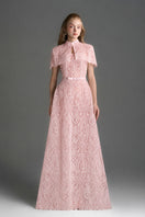 Light pink architectural lace bustier A-line gown with mini cape and crystal embellishments, designed by I.H.F Studio.