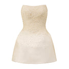 Beige beaded mini dress by I.H.F Studio featuring a fitted bustier style and intricate bead detailing.