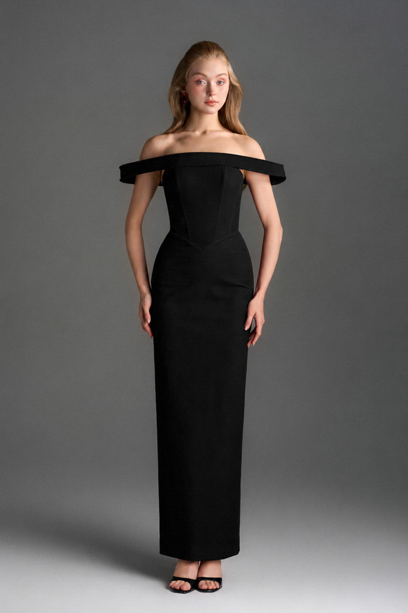 Black velvet bustier midi gown with horizontal train by I.H.F Studio, featuring a fitted bustier top and flowing column silhouette.