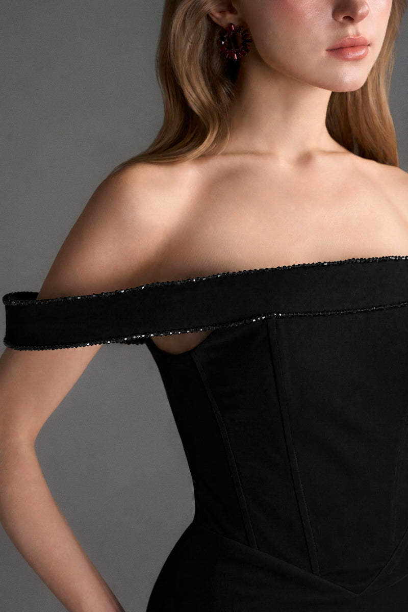 Black velvet bustier midi gown with horizontal train by I.H.F Studio, elegant column dress with fitted bodice and flowing train.