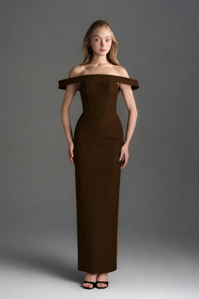 Dark brown Lyon velvet bustier gown by I.H.F Studio featuring a midi column silhouette with a horizontal train.
