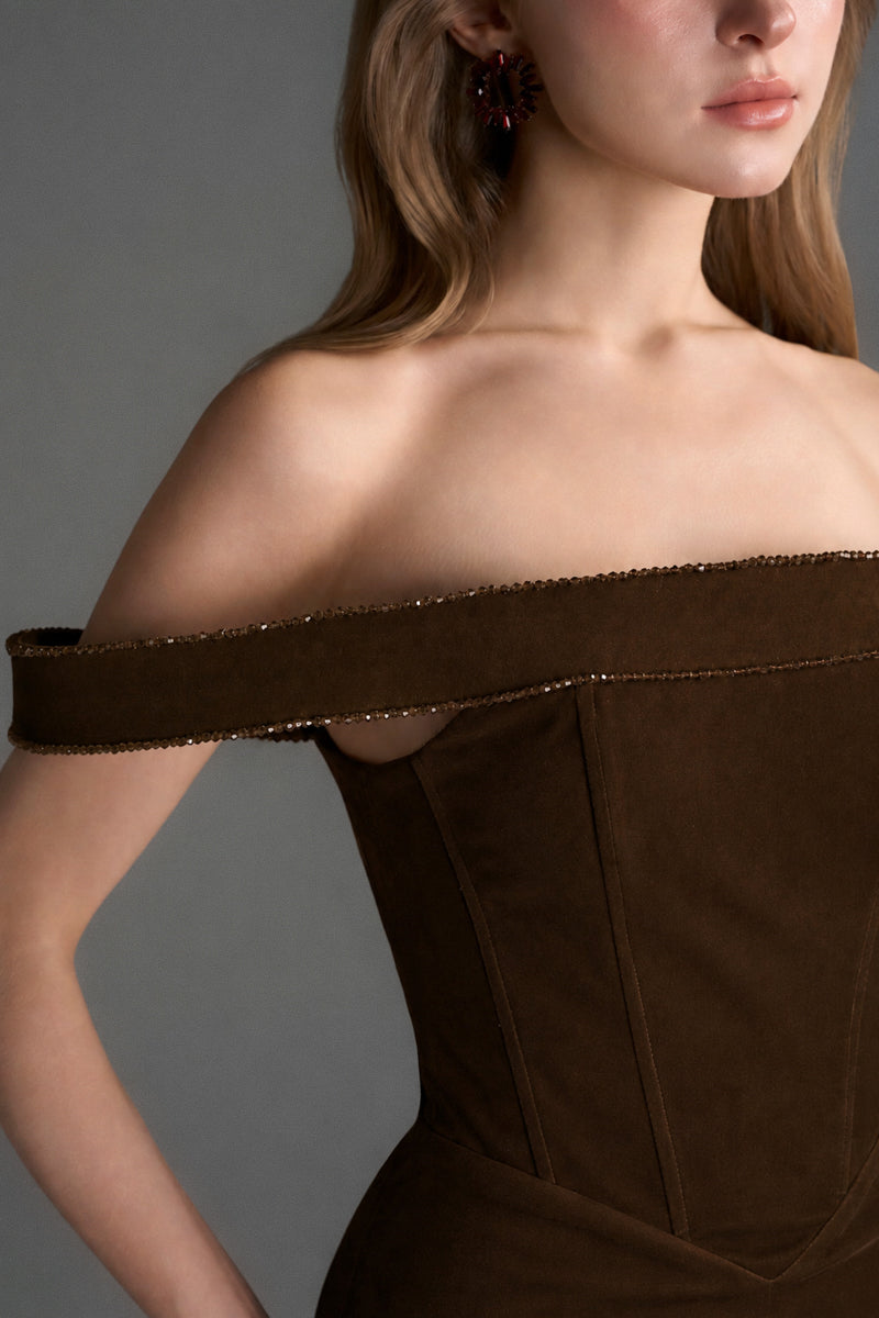 Dark brown velvet gown by I.H.F Studio featuring a bustier top, midi column silhouette, and a horizontal train.