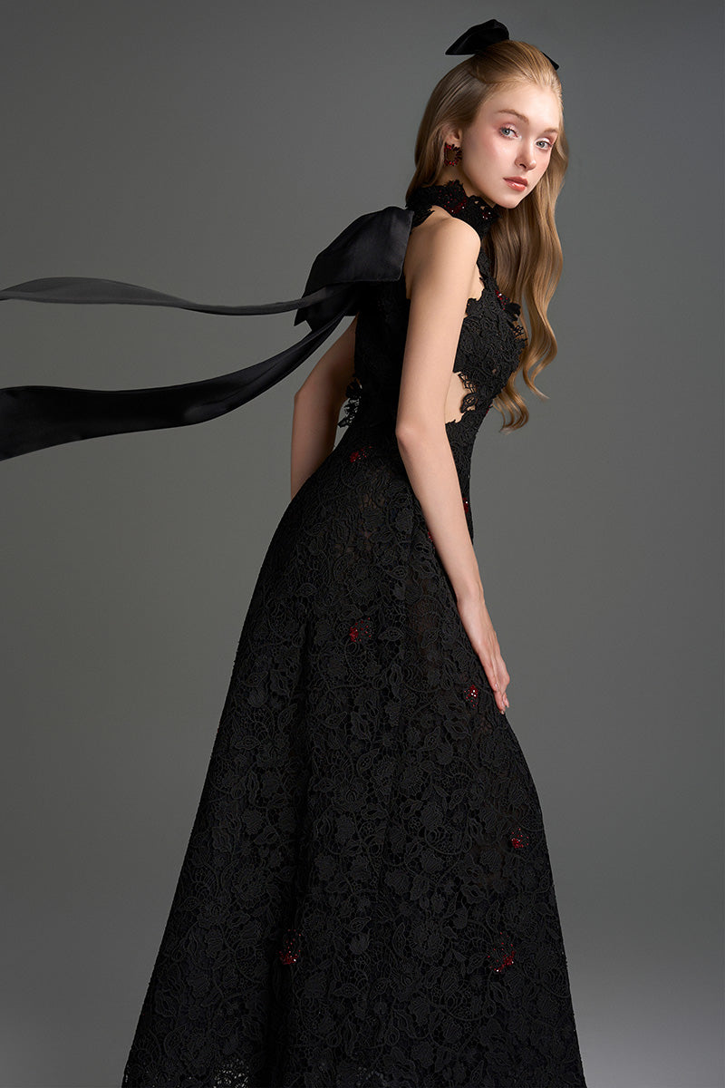 Black lace halter midi gown with floral vine design, A-line silhouette, and waist cut from I.H.F Studio.