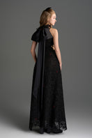 Black lace halter midi gown with floral vine pattern from I.H.F Studio featuring an A-line silhouette and waist cut detail.