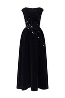 Elegant black velvet A-line midi gown by I.H.F Studio, featuring a flowing silhouette and stylish design.