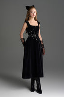 Black Lyon velvet A-line midi gown with branch detailing from I.H.F Studio, featuring a smooth, elegant silhouette.