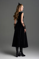 Black Lyon velvet A-line midi gown by I.H.F Studio featuring a sleek silhouette and elegant design.