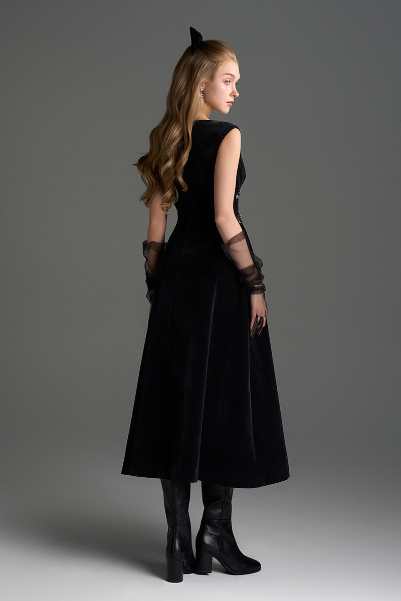 Black Lyon velvet A-line midi gown by I.H.F Studio featuring a sleek silhouette and elegant design.