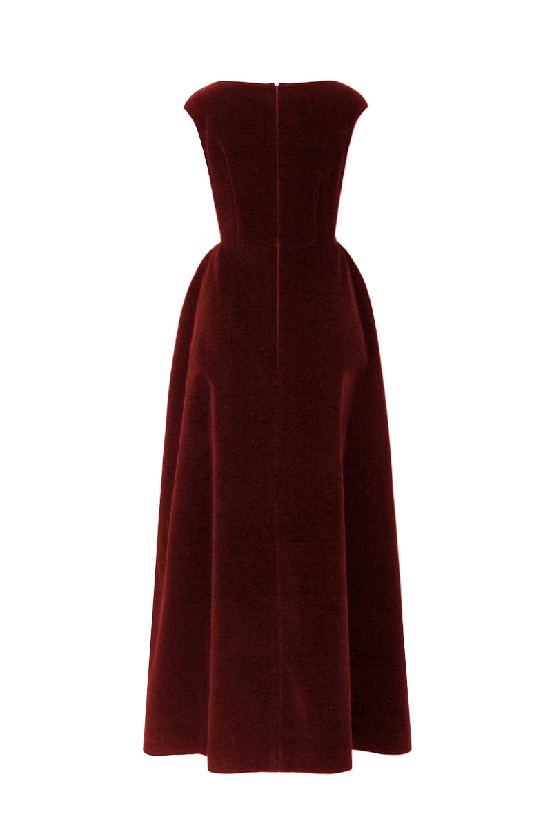 Red velvet A-line midi gown by I.H.F Studio featuring a flowing silhouette and elegant design, displayed on a mannequin.