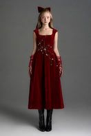Red velvet A-line midi gown by I.H.F Studio featuring a sleek silhouette and elegant design, perfect for formal occasions.