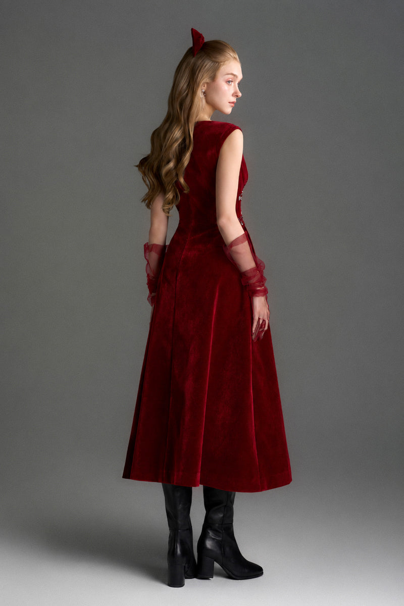 Red velvet A-line midi gown by I.H.F Studio featuring a sleek design and elegant silhouette.