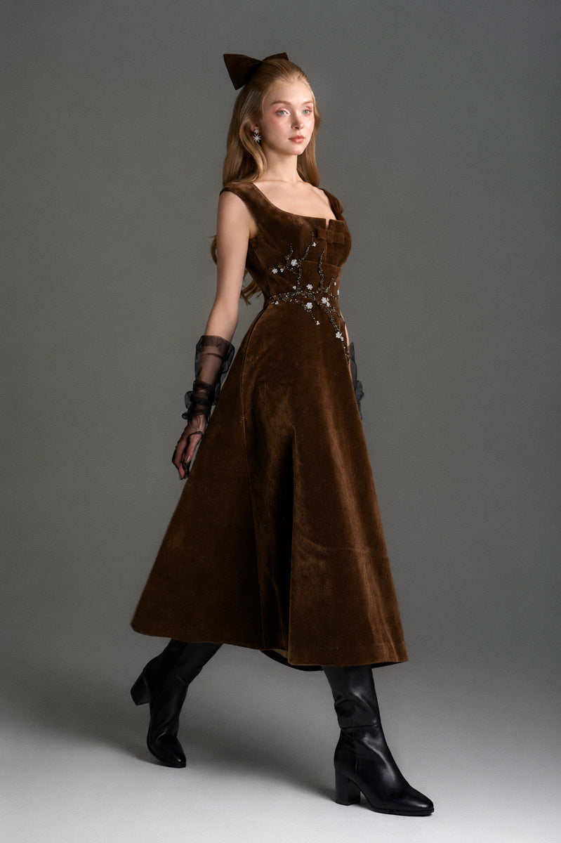 Brown velvet Lyon A-line midi gown by I.H.F Studio, featuring a elegant flowing silhouette and rich fabric texture.