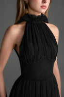 Black A-line gown with vine guipure lace and ruffle collar by I.H.F Studio, featuring elegant lace details and a flowing silhouette.