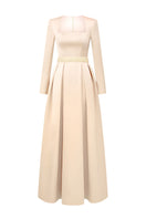 Elegant gold silk taffeta gown by I.H.F Studio, featuring flowing fabric and sophisticated design, perfect for formal occasions.