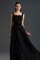 Black floral lace A-line gown with square neckline and velvet waist belt by I.H.F Studio, featuring intricate lace details.