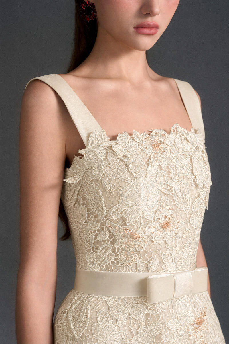 Ivory floral lace A-line gown with square neckline and velvet waist belt by I.H.F Studio, displayed on a dress form.