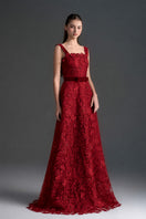 Red floral lace A-line gown with square neckline and velvet waist belt by I.H.F Studio, showcasing intricate lace details and elegant design.