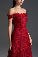 Red floral lace off-shoulder A-line gown by I.H.F Studio featuring a silk waist belt and elegant design.