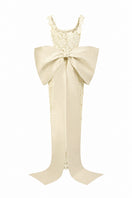 Ivory floral lace square-neck column gown by I.H.F Studio with a large back bow, elegant and perfect for formal occasions.