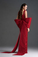 Red floral lace garden gown by I.H.F Studio featuring a square neck, fitted column silhouette, and a large back bow.