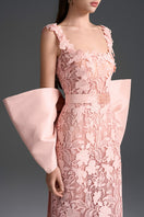 Light pink floral garden lace gown with a square neckline, column silhouette, and large back bow by I.H.F Studio.
